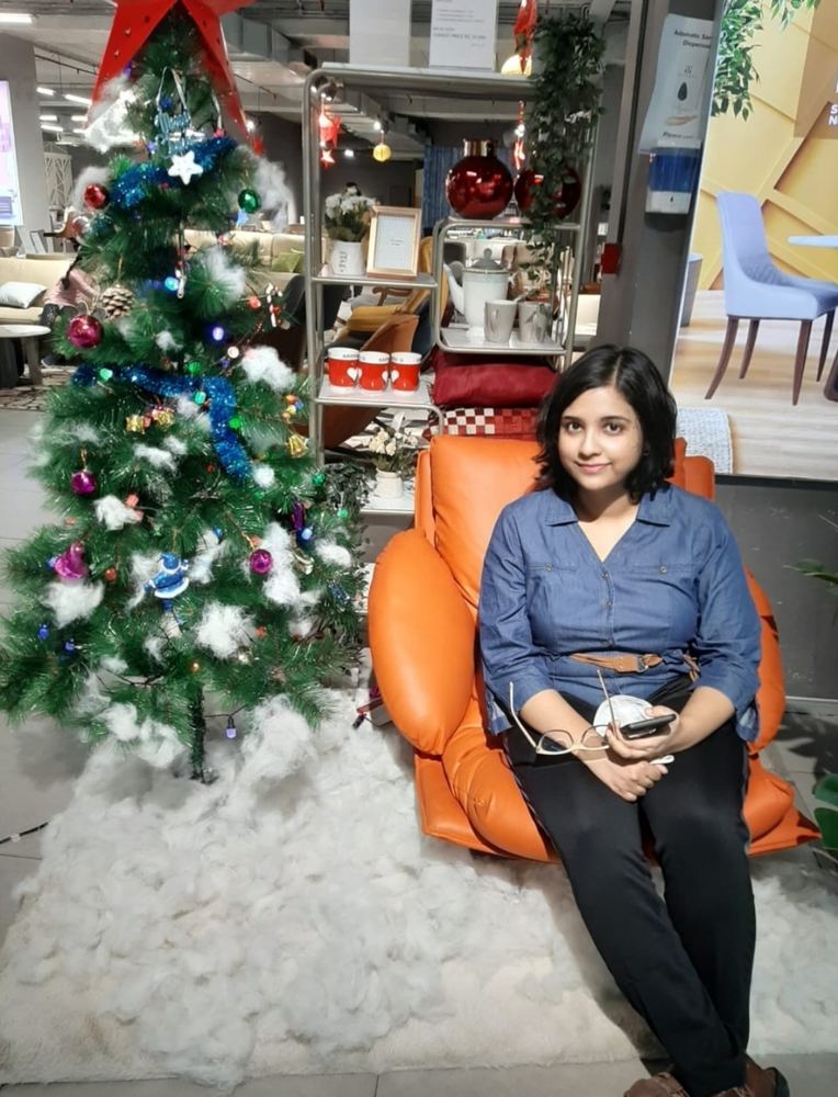 Christmas tree, orange couch, no regrets