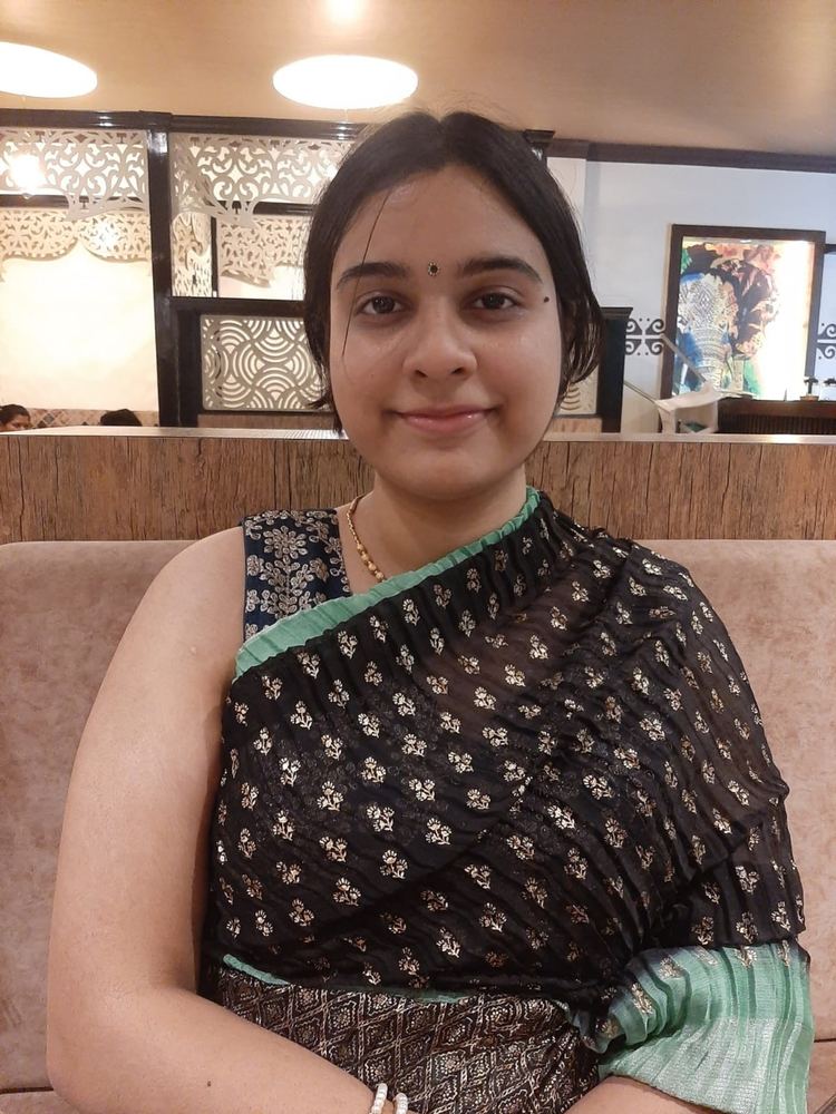restaurant-ready in a saree
