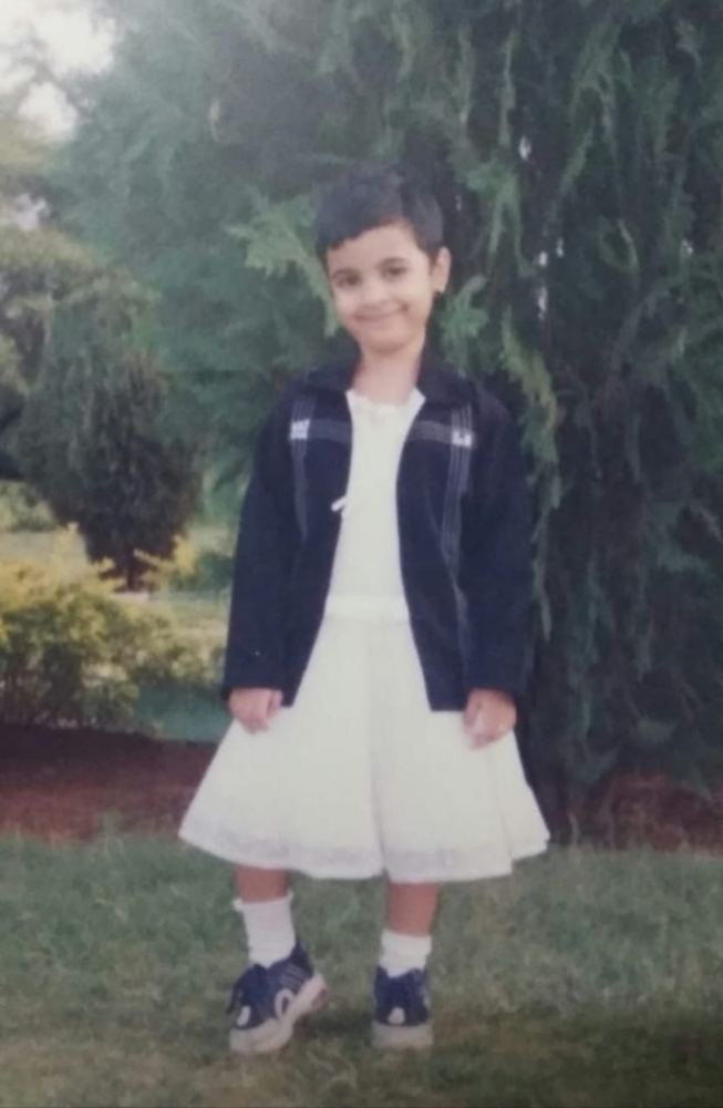 white dress, black jacket, no notes